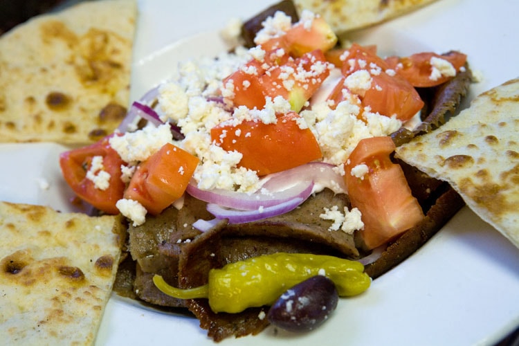 Fazzi's gyro plate with pita, tomato, feta, and pepperoncini