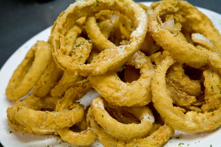 Fazzi's made-to-order hand-breaded fried onion rings